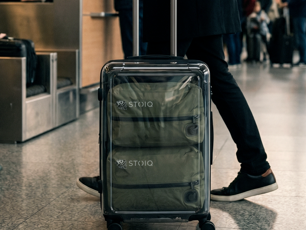 Stoiq vacuum compression bag with TSA-friendly built-in pump at the airport
