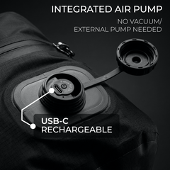 Stoiq built-in USB-C rechargeable vacuum pump on a compression travel bag