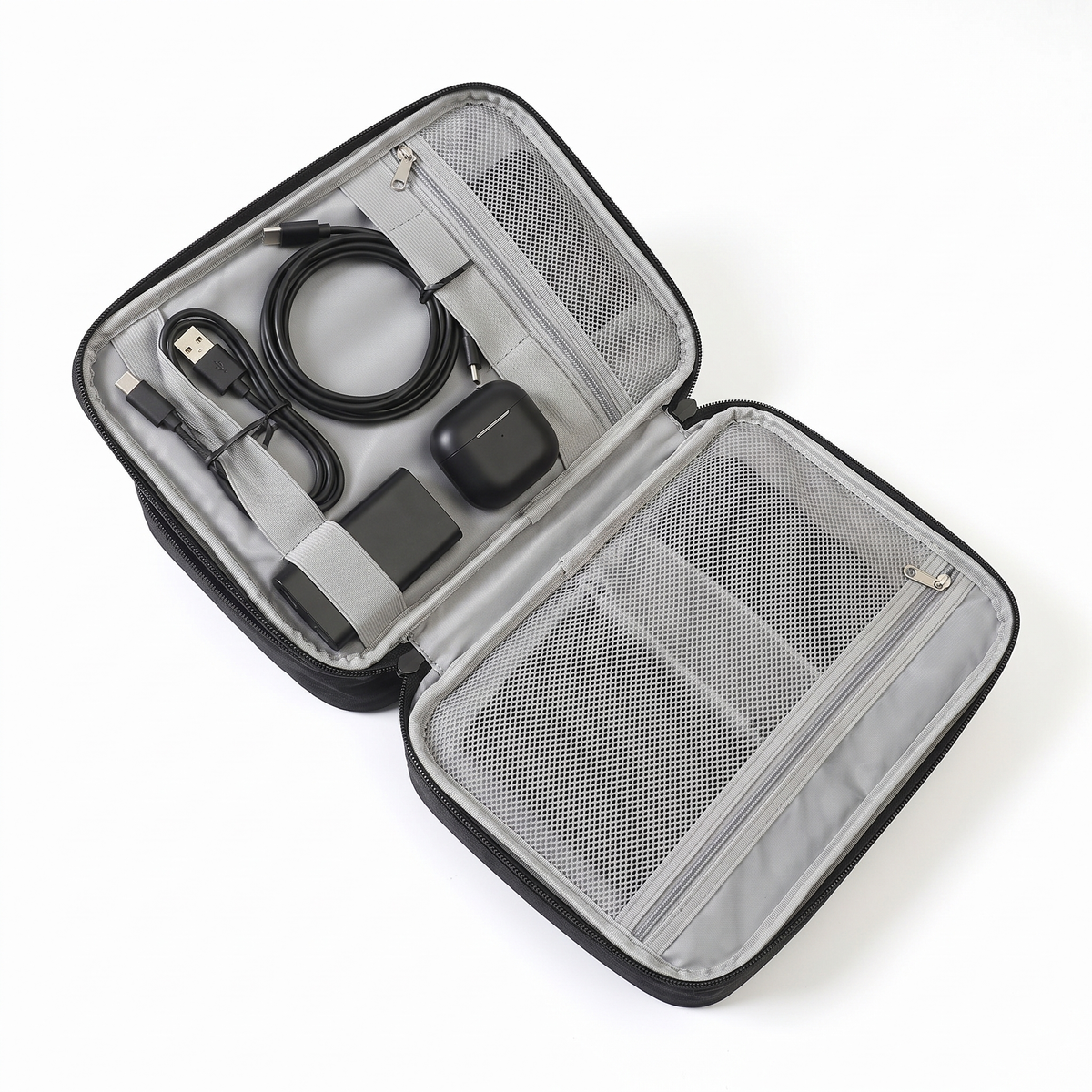 Stoiq Cable Organizer open, cables, earbuds and power bank in the elastic loops