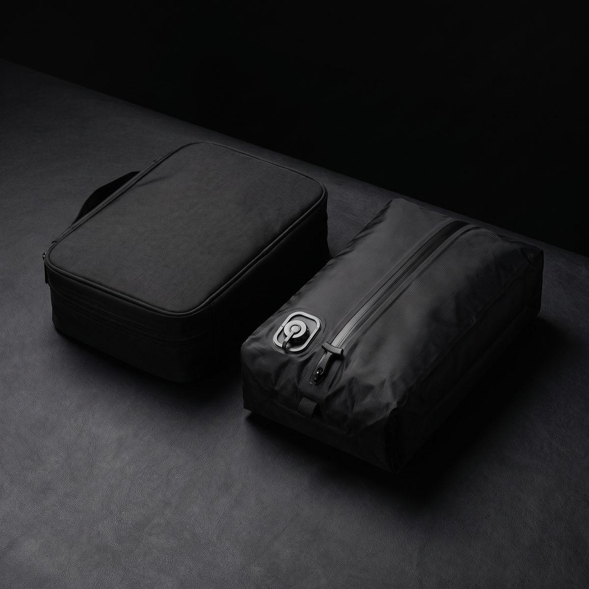 Stoiq Cable Organizer beside the Stoiq 20L compression bag
