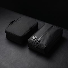Stoiq Cable Organizer beside the Stoiq 20L compression bag